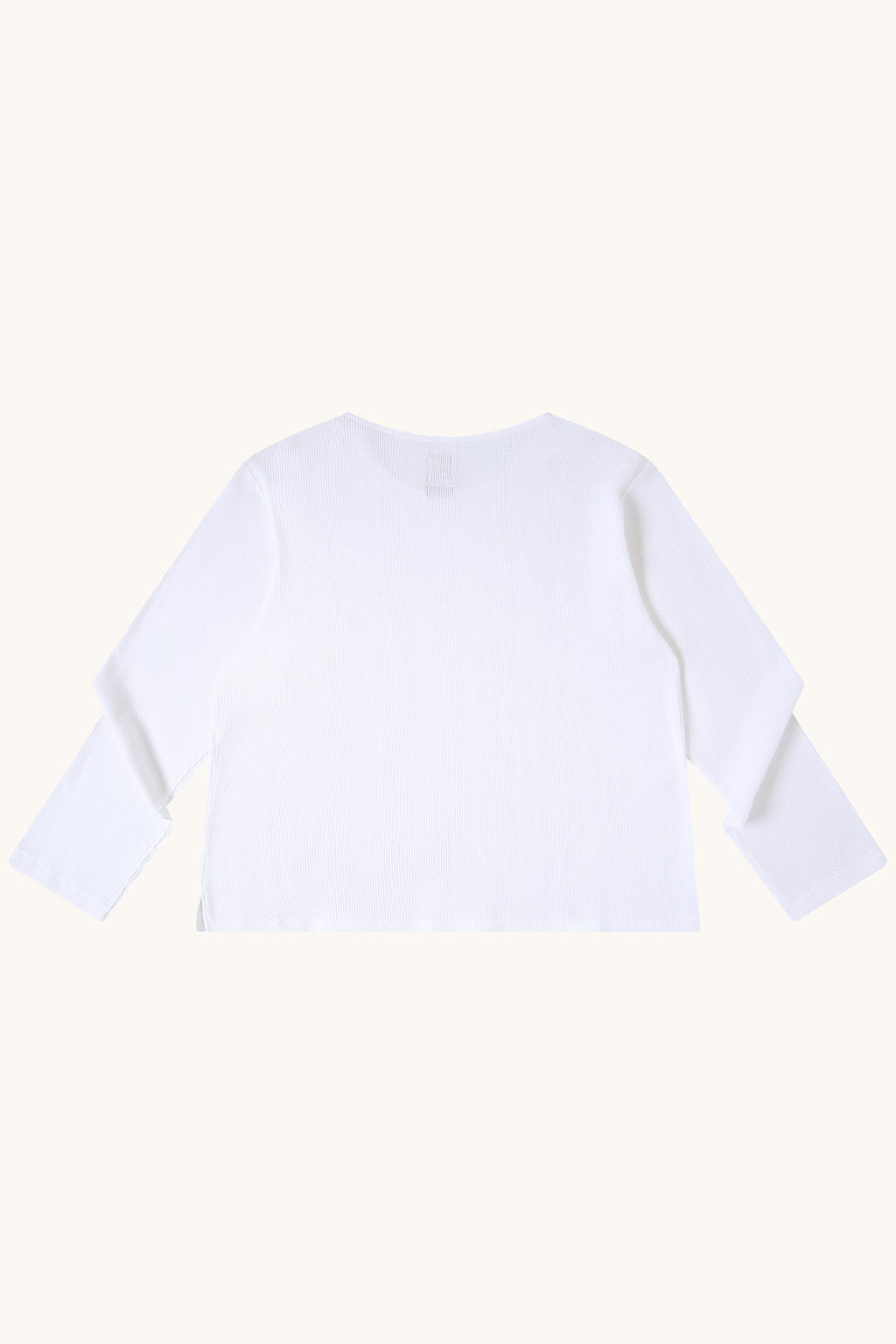 MEG.S white 100% cotton waffle knit long sleeve shirt with wide neck and split hem.